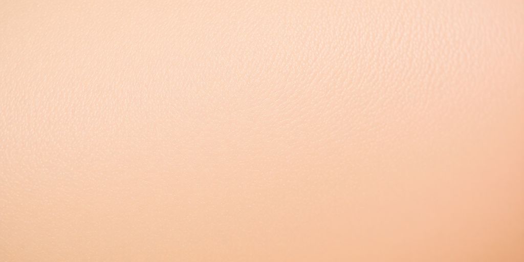 Smooth, radiant skin with subtle product reflections.